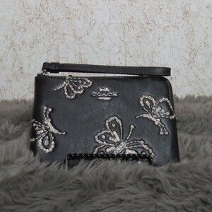 Coach Corner Zip Wristlet with Sparkly Butterfly (Black)